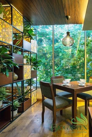 Beautiful interior design, green corner, feel relaxing in a busy city at Biogarten Restaurant in Ho Chi Minh City