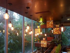 Warm atmosphere in raining day at Biogarten Restaurant in Ho Chi Minh City