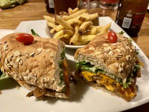 Philly cheesesteak with fries  at El Maple in Quito