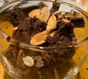 Black chocolate Sundae with flaked almonds and sunflower seeds - odd combo that works!  at Greenr Cafe in Gurgaon