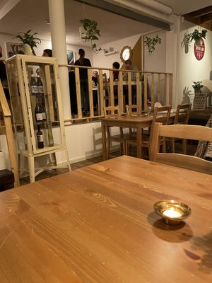Small, intimate dining room  at Outro Lado in Faro