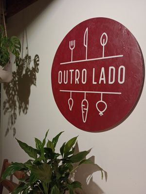 Sign at Outro Lado in Faro