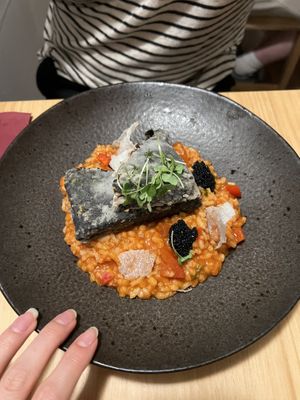 Fishy tofu with tomato ricee  at Outro Lado in Faro