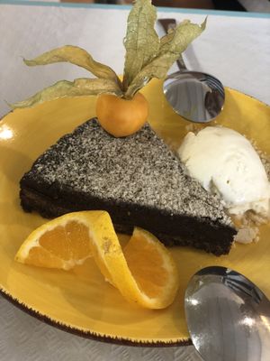 Delicious carob and almond pie !  at Outro Lado in Faro