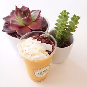 Mango Lassi smoothie with toppings at KONOÏ Hemp Milk Bar in Vienna