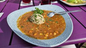 Kichererbsengulasch mit Semmelknödel at UNI.WIRT. in Klagenfurt