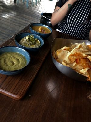 Trio dip consisting of the Salsa Verde, Hummus dip and Chili Con Quest at V-Eats in Dallas