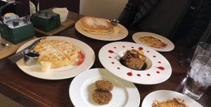 pancakes, waffle, banana foster, sausages and potato hash at V-Eats in Dallas