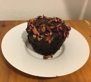 Vegan chocolate goji muffin (on a plate from my home).  at Juice Generation - 8th Ave in New York City