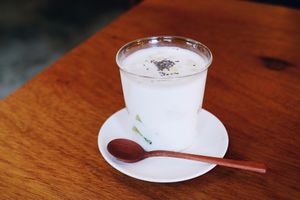 Che, sweet Vietnamese dessert soup with coconut milk, glutinous rice balls, chia seeds, sunflower seeds, bananas, kiwis at Yama-Shoku-On - Plant Lab in Kyoto