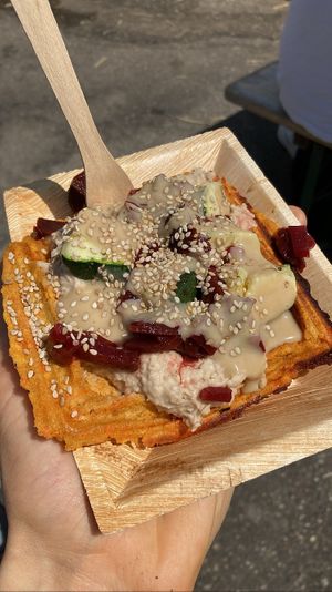 Savory waffle with bean hummus and veggies  at Lunchcafe Curcuma in Gouda