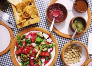 Vegan grapefruit salad and lots of free sides at Cabuche in Oaxaca