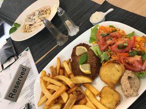 Milanese cutlet with fries and salad and Carbonara pasta at Veni Vidi Vegan in Charleroi