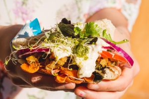 Beer Batter mushroom pocket with Tadzhik , kumara skins, tomato , pesto and micro greens. at Mr Jackson's Plant Based Food Truck in Tauranga