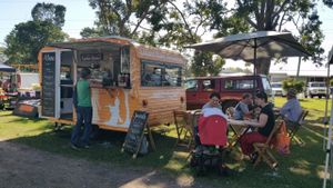 Look our for the bright orange caravan. We have tables and chairs for a fine dining experience ;) at Krishnas Kitchen in Mareeba Shire