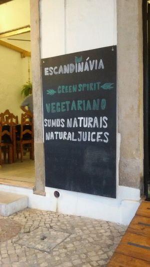 Sign on the entrance at Escandinavia Green Spirit in Fuseta