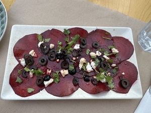 Beet carpaccio with vegan feta & truffle oil   at Escandinavia Green Spirit in Fuseta