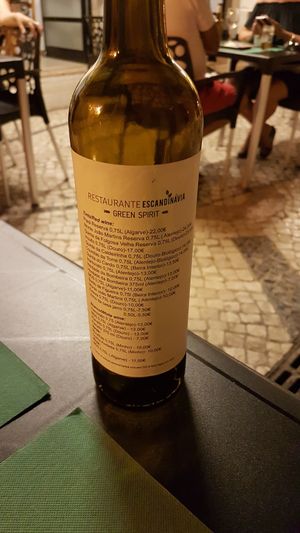 Wine list on a wine bottle at Escandinavia Green Spirit in Fuseta