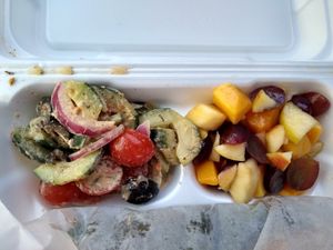 Cucumber and tomato salad and seasonal fruit at Plant Power Cafe & Juice Bar in Chattanooga