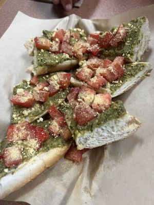 Pesto bruschetta. Tastes better than it looks.. sooo flavorful and juicy!!   at Plant Power Cafe & Juice Bar in Chattanooga