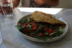 Chickpea omelette with mushrooms and salad at Acacia in Frederiksberg
