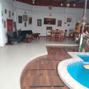 por 3 ra vez nos mudamos a un lugar mas amplio muy acogedor con piscina pensando en el calor de pucallpa esperamos tenerte pronto un lugar muy ttranquilo  at Elixir Restaurante Pucallpa in Pucallpa
