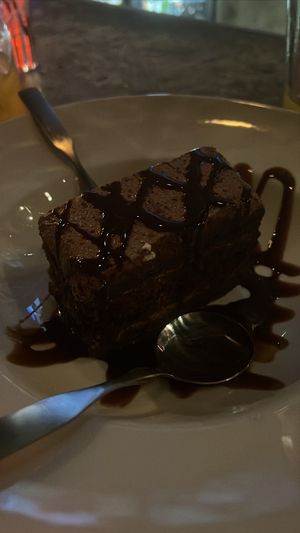 Vegan Chocolate Cake (Raspberry Sauce on the side!)  at Nacho Daddy - The Strip in Las Vegas