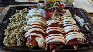 Enchiladas with half red and half green sauce at Nacho Daddy - The Strip in Las Vegas