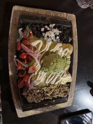 Vegan enchiladas with added guacamole   at Nacho Daddy - The Strip in Las Vegas