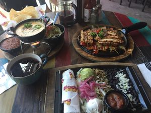 Vegan queso, guac, and vegan chick’n fajitas at Nacho Daddy - The Strip in Las Vegas