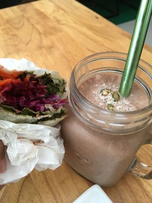 Roasted veggie and herbed cheese wrap with a chocolate raw cacao smoothie at Nourish Cafe in Yangon