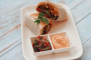 Seitan Burrito - full of flavour and nutrition and served with paprika dip and fresh salsa at Nourish Cafe in Yangon