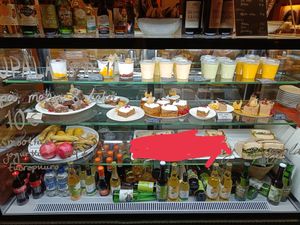 Various items on display. The redded-out sandwiches had meat :( at Espresso Edge in Helsinki