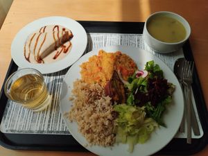 Green bean soup; whole grain basmati rice, quinoa, baked sweet potato, daal with shredded seitan, cabbage and salad & "yogurt" cake with coconut cream topping at Cozinha Consciente in Coimbra