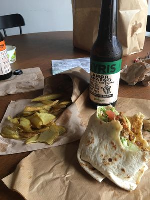 Combo meal. Artesan beer, oily fries, delicious kebap. June 2018 at Aloha Vegan Delights in Valencia