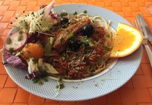 Soya spaghetti bolognese with salad at Arvore do Mundo in Porto