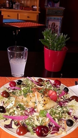 Samosas with salad. at Arvore do Mundo in Porto