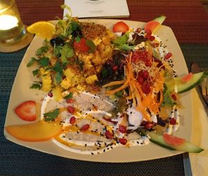Tofu espiritual (tofu and potatoes with crumble) and salad at Arvore do Mundo in Porto