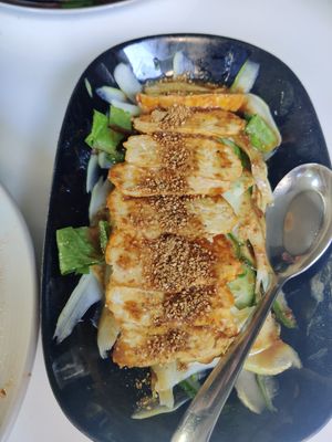 Homemade tempeh with cucumber salad at Ama Vegan Kitchen in Chiang Mai