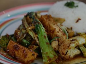 Peanut stir-fry tofu and veggies with rice at The Banyan Tree in 