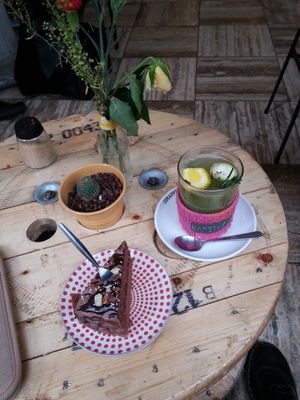 homemade lemon-rosemary hot tea and chocolate cake at KAFETHEA in Maastricht