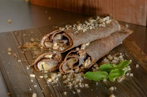 Tortilla with pesto nougat wanuts and banana at EcO Bar in Tel Aviv