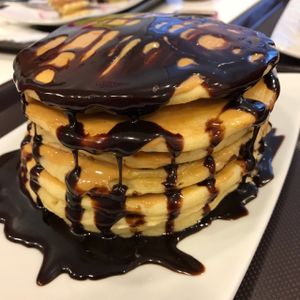 The Tower Menu (6 pancakes + topping) with chocolate and peanut butter. at Tweny Leaf in Lisbon