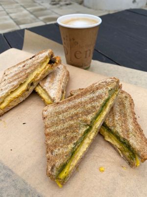 Vegan cheese toasties... gluten free sprouted quinoa bread, biocheese, our own cashew 'cheddar'... choice of pesto or kimchi.  at The Little Shop of Plenty in Maylands