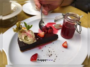 Dark chokolate cake with hot cherry sauce and tarragon ice cream at Aed Restaurant in Tallinn