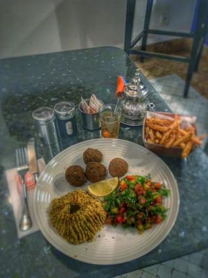 Delicious falafel, humous & salad with fries and herb tea at Cafe Clock in Marrakech
