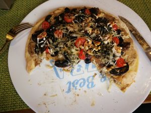 I had to dive in! A delicious vegan pizza with mushroom cream, mushroom, onion, olives, Walnuts and vegan cheese 😋 at Veggie's World in Andorra La Vella