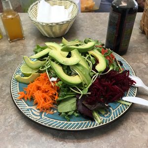 House salad with avocado. at Vegan and Juice in Miami