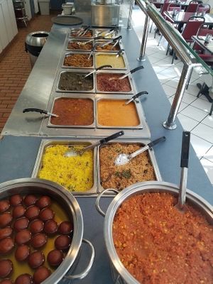 All you can eat Weekend Buffet: lemon rice, coconut rice,chana masala, paneer tikka masala, baingan bharta, dal makhani, coconut tindora curry, aloo beans, turai dal, vegetable pakora, vada, and plain and besan idli at Foodland Authentic Indian Cuisine in Corona