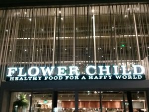 signage at Flower Child in Santa Monica